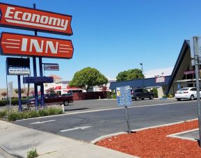 Hotel exterior at Economy Inn, Fresno.