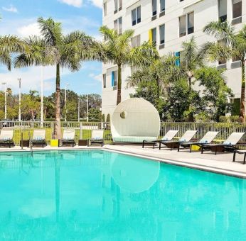 Outdoor pool at Aloft Miami Doral.
