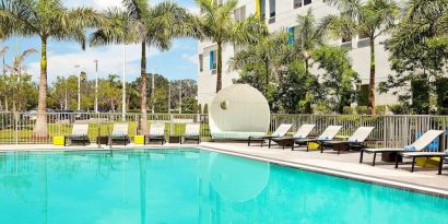 Outdoor pool at Aloft Miami Doral.
