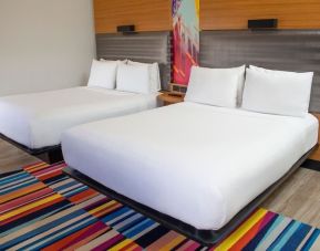 Day use room with two beds at Aloft Miami Doral.
