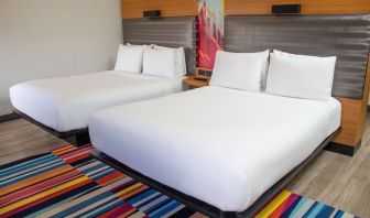 Day use room with two beds at Aloft Miami Doral.
