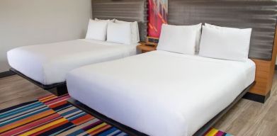 Day use room with two beds at Aloft Miami Doral.
