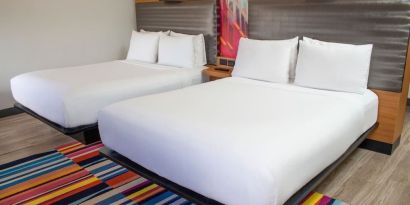 Day use room with two beds at Aloft Miami Doral.
