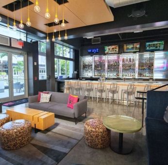 Coworking space and lounge at Aloft Miami Doral.
