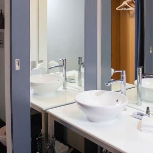 Guest bathroom with shower at Aloft Miami Doral.
