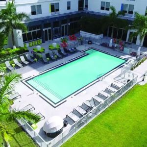 Outdoor pool area at Aloft Miami Doral.
