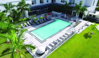 Outdoor pool area at Aloft Miami Doral.
