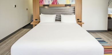 Romantic king room at Aloft Miami Doral.
