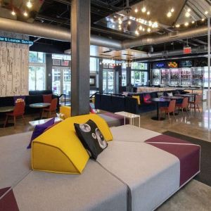 lobby and seating area at Aloft Miami Doral.
