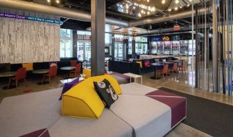 lobby and seating area at Aloft Miami Doral.
