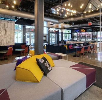 lobby and seating area at Aloft Miami Doral.
