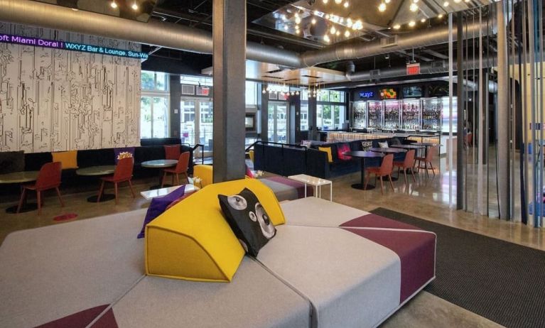 lobby and seating area at Aloft Miami Doral.
