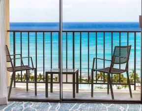 Day room with balcony and sea view at Hyatt Place Waikiki Beach.