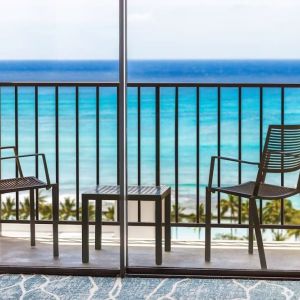 Day room with balcony and sea view at Hyatt Place Waikiki Beach.