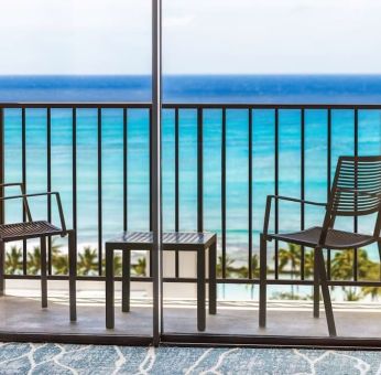 Day room with balcony and sea view at Hyatt Place Waikiki Beach.