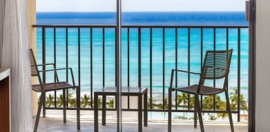 Day room with balcony and sea view at Hyatt Place Waikiki Beach.