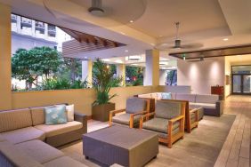 Lounge and coworking space at Hyatt Place Waikiki Beach.