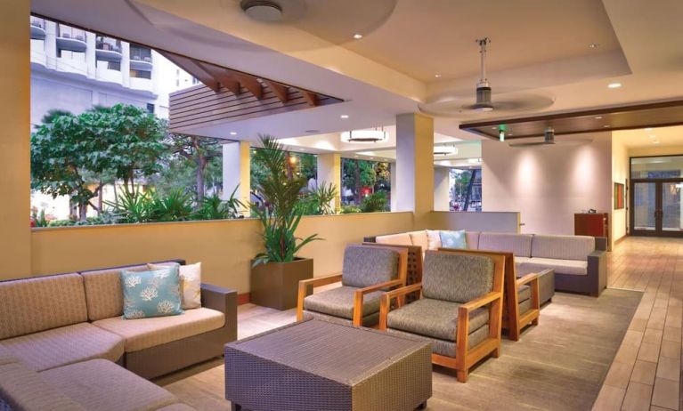 Lounge and coworking space at Hyatt Place Waikiki Beach.