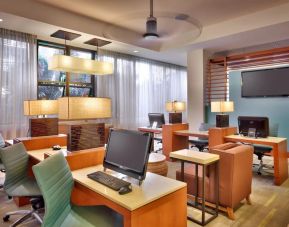 Business center at Hyatt Place Waikiki Beach.