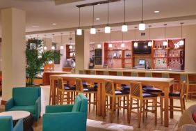 Hotel bar and coworking area at Hyatt Place Waikiki Beach.