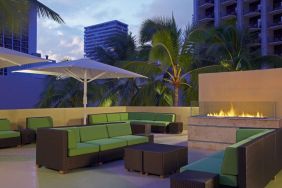 Rooftop terrace and fire pit at Hyatt Place Waikiki Beach.