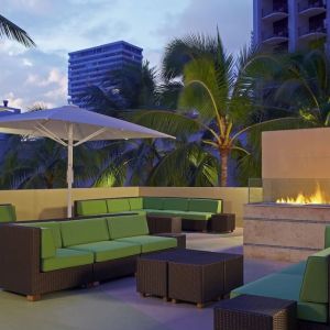 Rooftop terrace and fire pit at Hyatt Place Waikiki Beach.