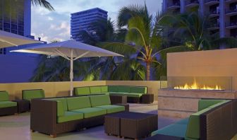 Rooftop terrace and fire pit at Hyatt Place Waikiki Beach.