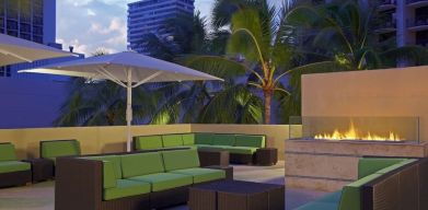 Rooftop terrace and fire pit at Hyatt Place Waikiki Beach.