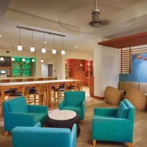 Lounge and lobby at Hyatt Place Waikiki Beach.