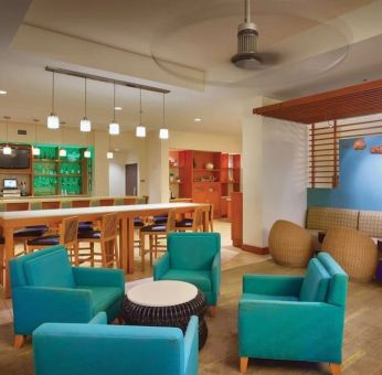 Lounge and lobby at Hyatt Place Waikiki Beach.