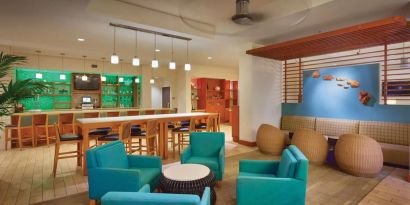 Lounge and lobby at Hyatt Place Waikiki Beach.