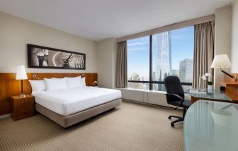 Spacious king room with work station at Millennium Downtown New York.