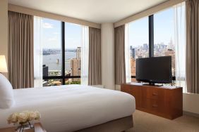 King room with TV at Millennium Downtown New York.