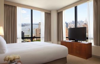 King room with TV at Millennium Downtown New York.