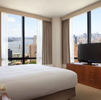 King room with TV at Millennium Downtown New York.