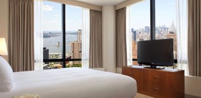 King room with TV at Millennium Downtown New York.