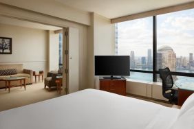 Comfortable day use room with TV and lounge at Millennium Downtown New York.