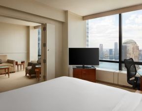 Comfortable day use room with TV and lounge at Millennium Downtown New York.