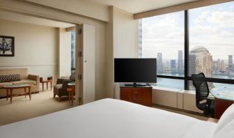 Comfortable day use room with TV and lounge at Millennium Downtown New York.