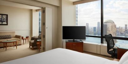 Comfortable day use room with TV and lounge at Millennium Downtown New York.