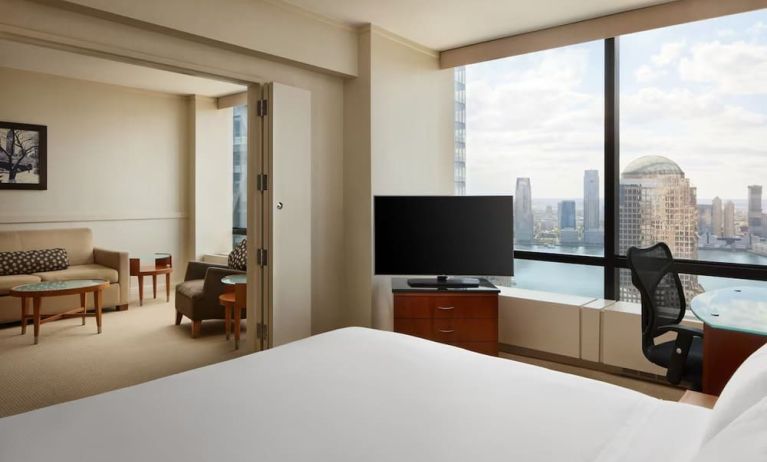 Comfortable day use room with TV and lounge at Millennium Downtown New York.