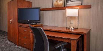 Business desk and TV at Courtyard Dulles Airport Chantilly.