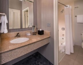 Guest bathroom with shower at Courtyard Dulles Airport Chantilly.