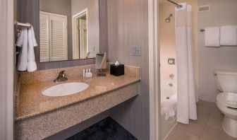 Guest bathroom with shower at Courtyard Dulles Airport Chantilly.