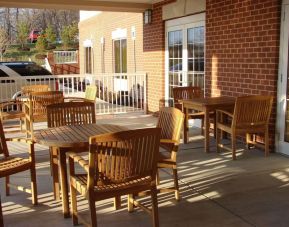 Outdoor seating and terrace at Country Inn & Suites By Radisson, BWI Airport.