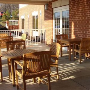 Outdoor seating and terrace at Country Inn & Suites By Radisson, BWI Airport.