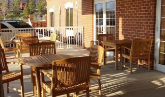 Outdoor seating and terrace at Country Inn & Suites By Radisson, BWI Airport.