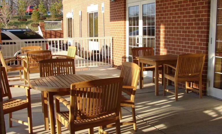 Outdoor seating and terrace at Country Inn & Suites By Radisson, BWI Airport.