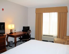 Day room with work desk at Country Inn & Suites By Radisson, BWI Airport.