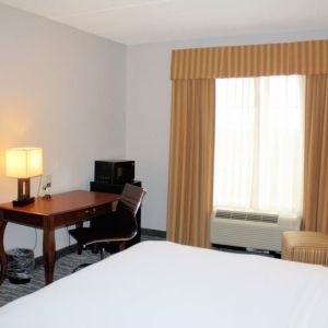 Day room with work desk at Country Inn & Suites By Radisson, BWI Airport.